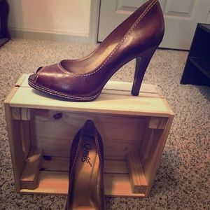 Brand new Carlos Santana peep toe heels.